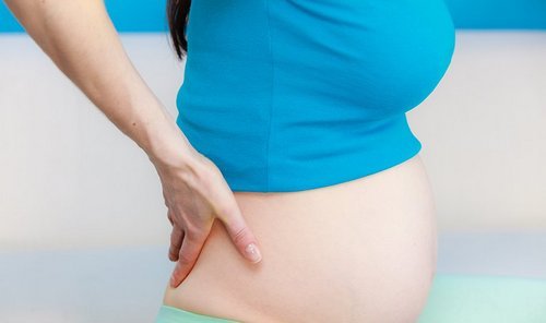 Чому коліт низ живота при вагітності, причини і лікування
