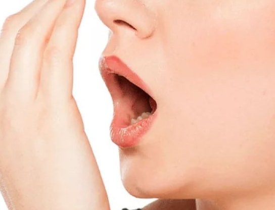 Неприємний і поганий запах з рота: причини і лікування