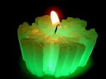 Зелена свічка для залучення грошей і процвітання