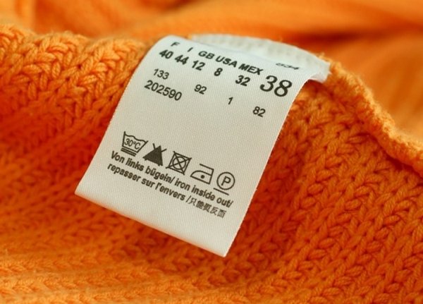 Як розшифровуються значки для прання на одязі?
