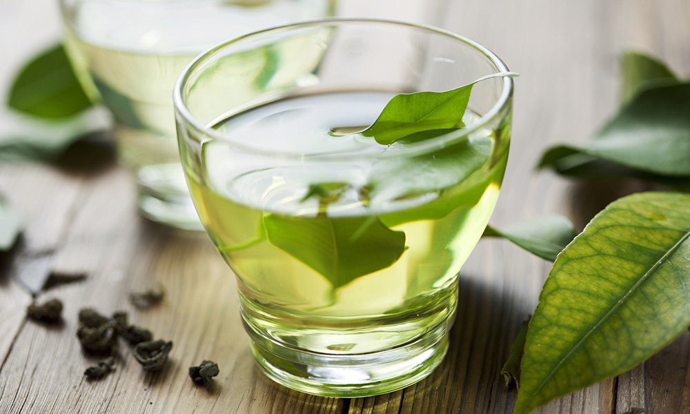 Зелений чай підвищує або знижує тиск: вплив на організм