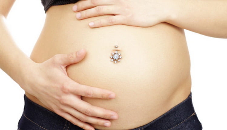 Болить пупок при вагітності: чому, що робити