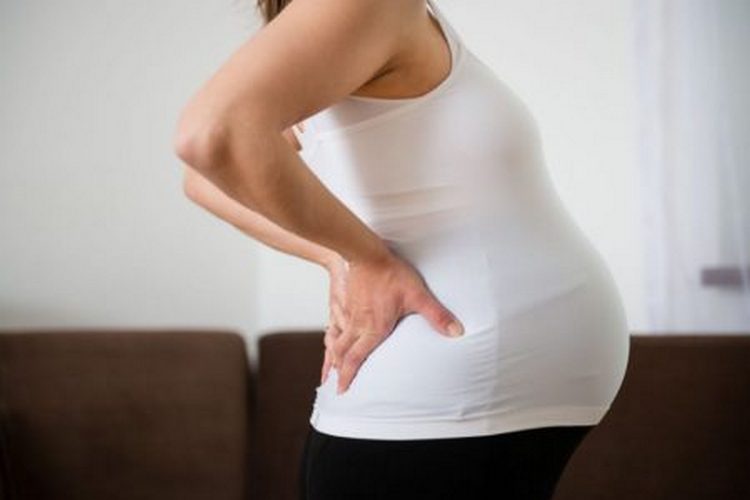 Болить спина при вагітності: норма і патологія