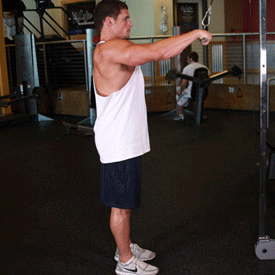 Як виконувати тягу на тренажері для тренування мязів спини?