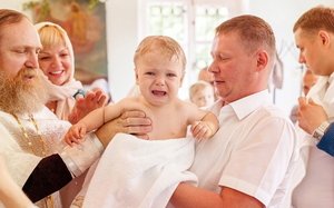Хто може бути хрещеними батьками: вибір серед родичів і друзів, їх обовязки